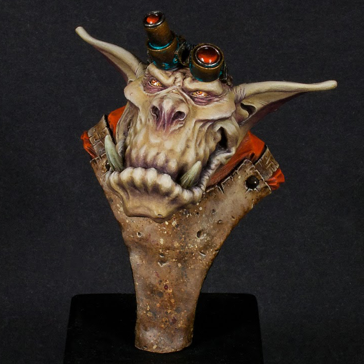 Orc miniature painted by Minichix studio. Leather apron distressed. Orc with googles and big pointy ears